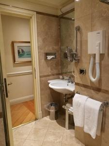 Koupelna v ubytování Suites Torre Dell'Orologio