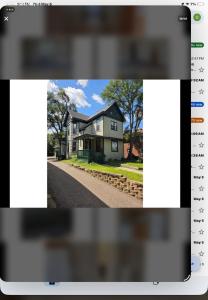 a screenshot of a house with a calendar on it at Robinsdale on broadway in Minneapolis