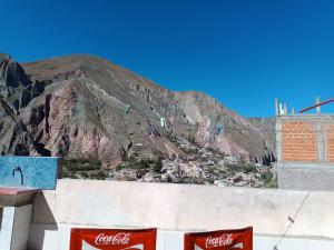 a view of a mountain from a cocacola building at El Refugio de Anita in Iruya