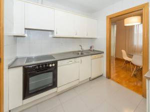 Kuchyňa alebo kuchynka v ubytovaní Gestión de Alojamientos Apartments