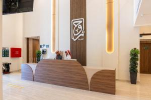 a lobby with a reception desk in a building at فندق روح المدينة in Medina