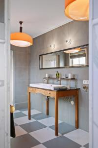 a bathroom with a sink and a mirror at Gentle in Bolsward +21 photos