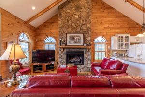 a living room with a couch and a fireplace at Buena Vista in Todd