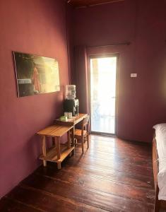 a room with a table and a coffee maker on a table at Pont NongKhiaw in Nongkhiaw +29 photos