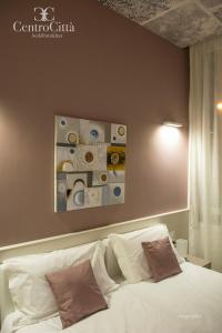 Postel nebo postele na pokoji v ubytování Centro Città Luxury B&B