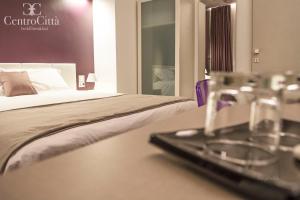 Postel nebo postele na pokoji v ubytování Centro Città Luxury B&B