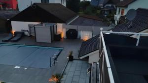 an aerial view of a house with a swimming pool at Villa-Mainaue in Maineck