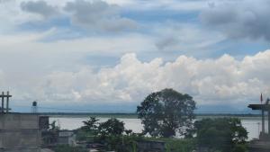 a view of a large body of water at Nandan Inn in Dibrugarh