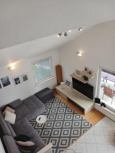 a living room with a couch and a table at Marko Apartment in Korčula