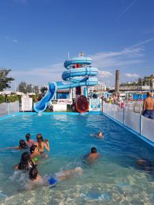 a group of people in the water on a cruise ship at Hotel Sport in Rimini