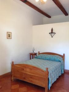 Voodi või voodid majutusasutuse La Casa de Cafe Bed and Breakfast toas