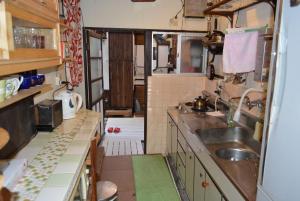 Kuchyň nebo kuchyňský kout v ubytování Guesthouse Bon
