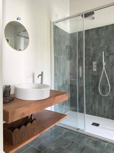 a bathroom with a sink and a shower at Le villette in Vasto +53 photos