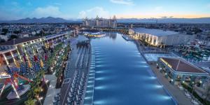 an aerial view of a city with a river at Granada Luxury Belek - Family Kids Concept in Belek