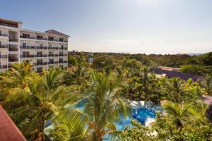 an aerial view of a resort with palm trees and a pool at Malika Blue Hotel Nungwi, Zanzibar in Banda Kuu