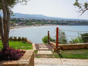 a view of a body of water with a beach at Thalassa Boutique Hotel & Spa in Paphos
