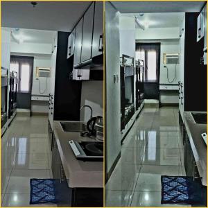 a kitchen with a sink and a counter top at Cozy Studio for 4 Guests in Dasmariñas
