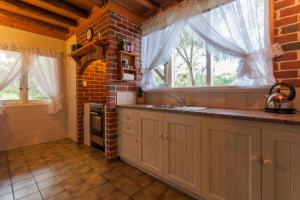 A kitchen or kitchenette at William Bay Cottages