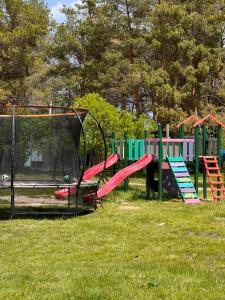 a group of playground equipment in a park at Sevan Resort No5 in Chʼkalovka