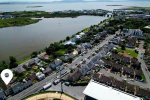 an aerial view of a town next to a body of water at Cuchulainn Townhouse in Galway