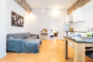 a living room with a couch and a table at Almenara in Almenara +15 photos