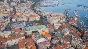 an aerial view of a city with a harbor at PRIMA FILA Premium Guest House in Sanremo