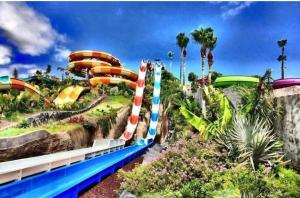 a water park with a roller coaster at Veiw Luxury Apartment in Adeje