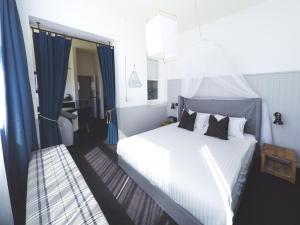 Postel nebo postele na pokoji v ubytování Hotel Palisade