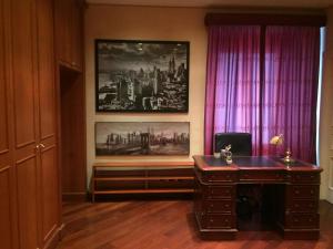 TV a/nebo společenská místnost v ubytování Loft Piazza Università