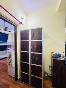 a room with a bunch of lockers in a room at Awara Hostels and Dormitory in Lucknow