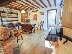 a living room with a couch and a table at 5 Castle Street in Newport