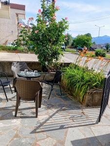 a table and chairs sitting on a patio at Anatoli's house in Kastoria