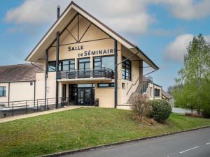 a large white building with asale sign on it at ibis Styles Vierzon in Vierzon