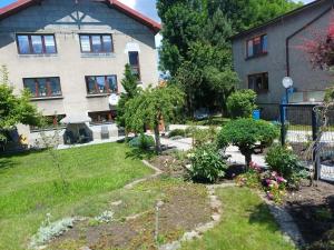 a garden in front of a house at ivlo in Pszczyna