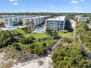 an aerial view of a resort with a pool at North Breakers - Unit 202, Wood Ave in East End