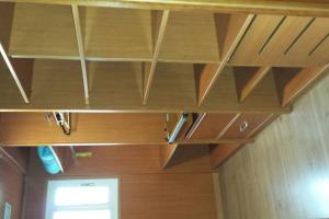 a row of wooden shelves in a room at Villa Castelló Salou (cerca Port Aventura) in Salou +38 photos