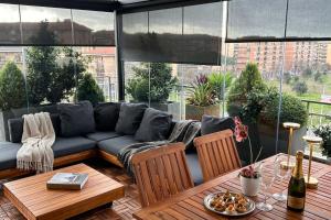 a living room with a couch and a table at Fiorucci Apartments - Veronica's House in Rome