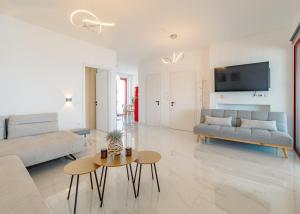 TV a/nebo společenská místnost v ubytování LB Apartment