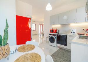 Kuchyň nebo kuchyňský kout v ubytování LB Apartment