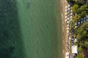 an overhead view of a beach and the ocean at KYMA STAY - Beachfront apartments in Pálioura +75 photos