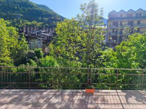 a balcony with a view of a city at Lu Cheur ad Zona Verde in Limone Piemonte