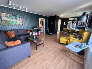 Et opholdsområde på Praktisk 3 roms leilighet