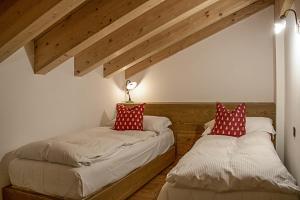 Postel nebo postele na pokoji v ubytování Residence Hotel K2
