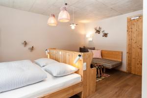 Postel nebo postele na pokoji v ubytování Langtaufererhof