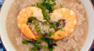 a bowl of food with shrimp on top of rice at Limlay House in Ban Suan On