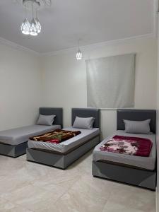 a room with two beds in a room at اطلال الهدا Al-Hada ruins in Taif +2 photos