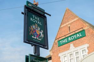 a sign for the royal in front of a brick building at Royal Inn in Scunthorpe