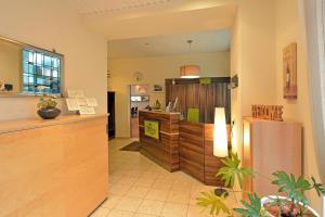 Kuchyň nebo kuchyňský kout v ubytování L' Angolo Ristorante & Hotel GmbH