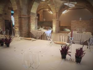 Reštaurácia alebo iné gastronomické zariadenie v ubytovaní Villa Anitori Prestige Relais & Spa