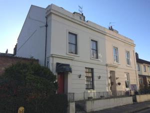 a white building on the side of a street at Lockyer House B&B in Plymouth